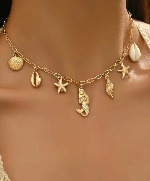 Goudkleurige ketting met Bedels